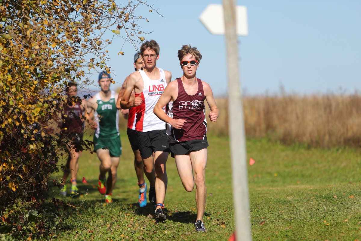 UNBAthletics's tweet photo. MXC: Michael Colford runs 12th at @SubwayAtlantic @AUS_SUA XC championship, named award winner. https://t.co/3rlWnBIoVg @UNBXC #IamVRed https://t.co/AfbTLZnOBq