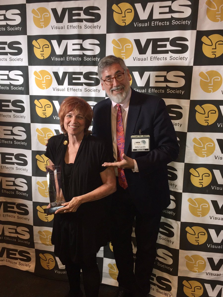 VFXSociety's tweet image. Founders Award recipient @tonipace celebrating with John Landis #VESSummit