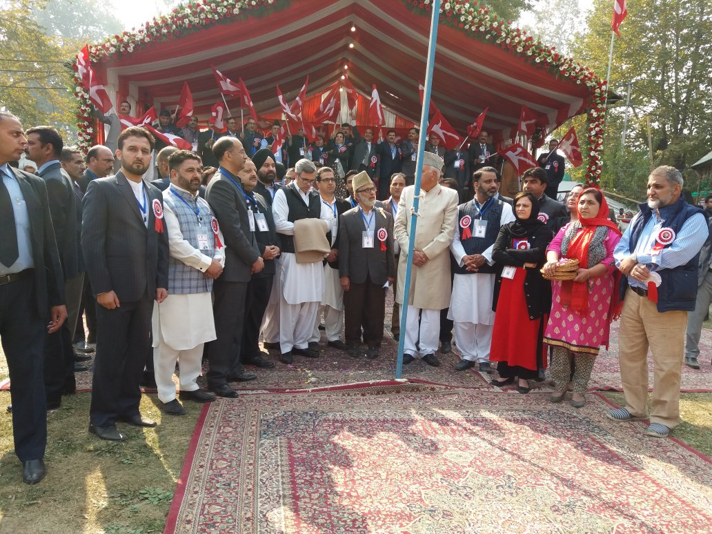 ImranNDar's tweet photo. @JKNC_ President Dr Farooq Abdullah, Working President @OmarAbdullah unfurled the party flag at Sher e Kashmir Stadium #DelegateSession 17 https://t.co/Ul8t6asXxA