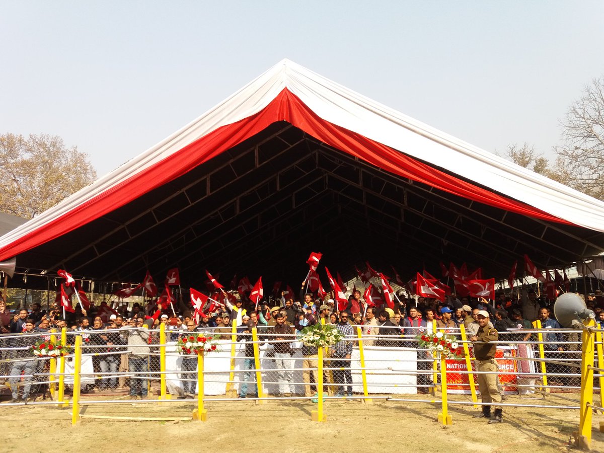 ImranNDar's tweet photo. @JKNC_ President Dr Farooq Abdullah, Working President @OmarAbdullah unfurled the party flag at Sher e Kashmir Stadium #DelegateSession 17 https://t.co/Ul8t6asXxA