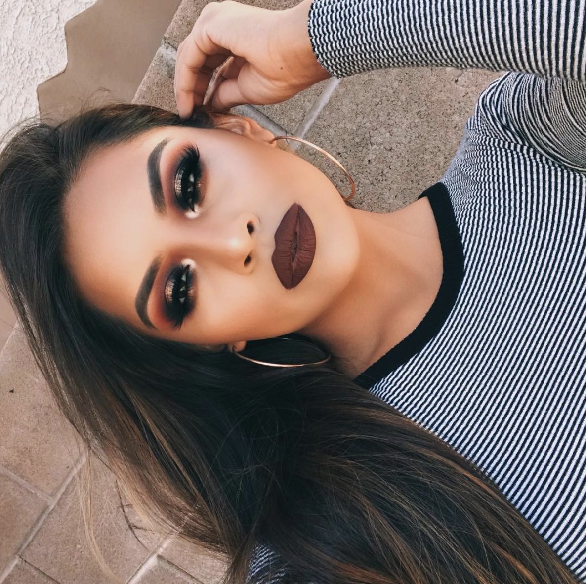Maybelline's tweet photo. The perfect fall lip. @iheart_sarahy slays in #VividMatte Liquid in 'Corrupt Cranberry'. Shop on @amazon: https://t.co/ZAnT4UTFIN. https://t.co/0fvQ26Y4el