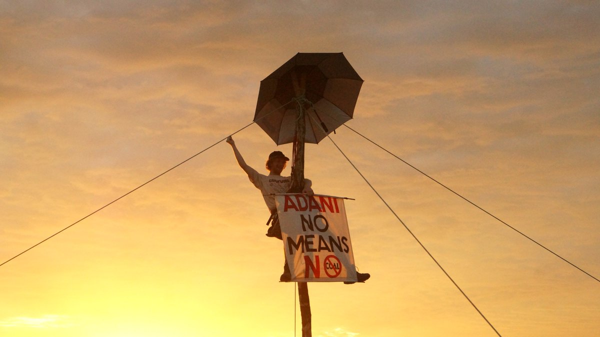 FLACCoal's tweet photo. Darcy has taken courageous peaceful action to stop work on the Adani railway line #Frontlineaction #BloackadeAdani #StopAdani https://t.co/mfVu8RI2HN