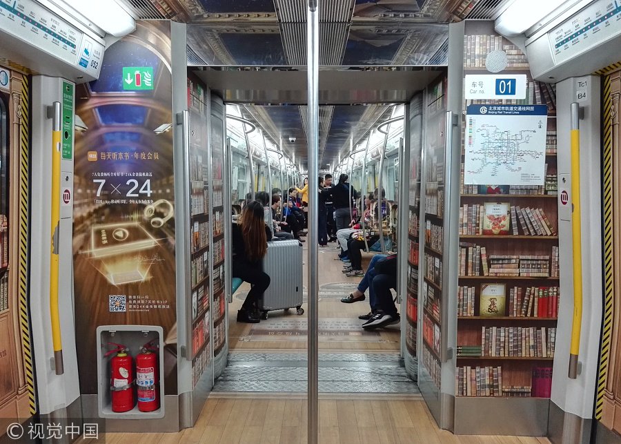 ChinaDaily's tweet image. A #library? No, a #subway carriage. Passengers can use their cellphones to sweep the code and then listen to the audio-books. (Photos: VCG)
