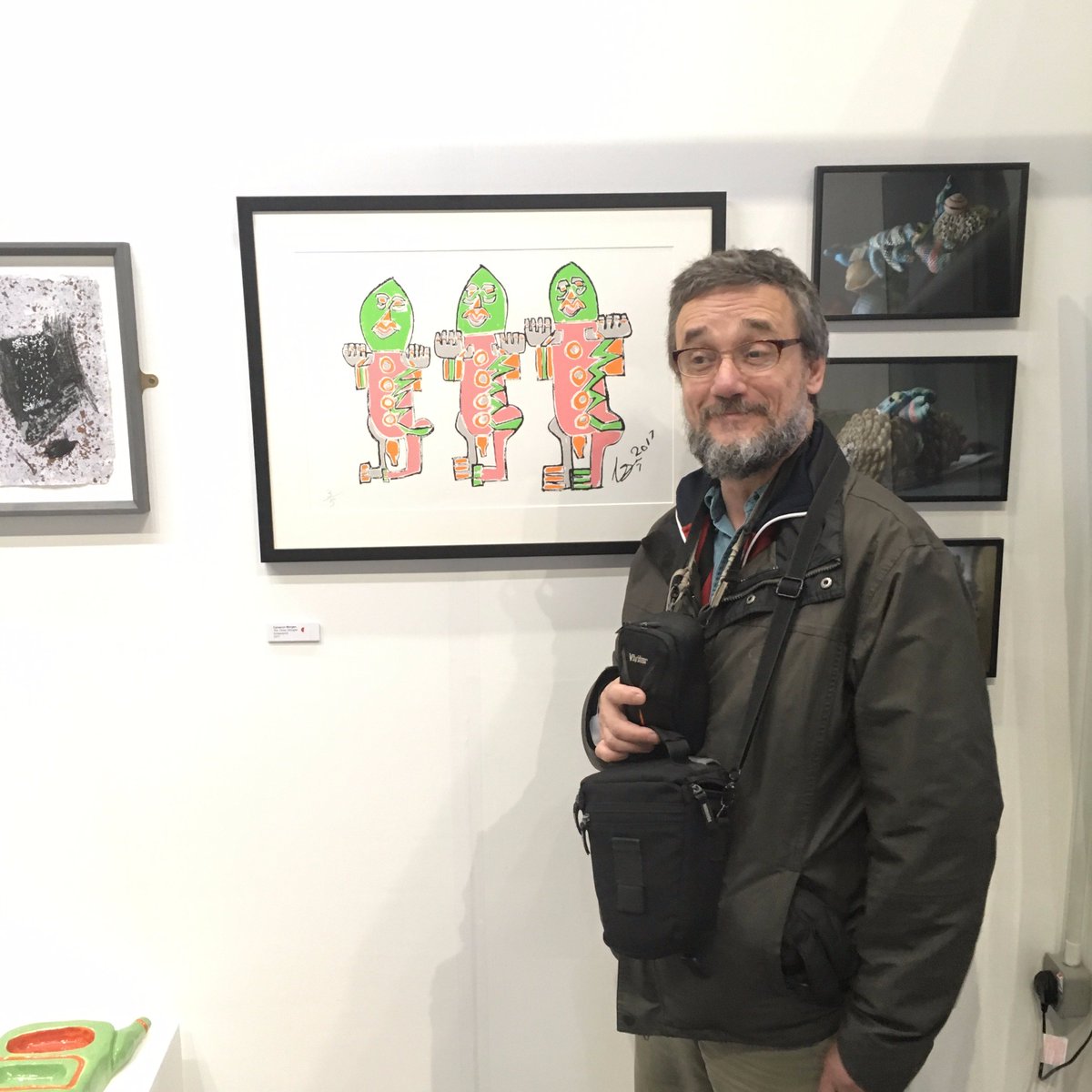 Project_Ability's tweet photo. Cameron Morgan in front of his (now sold) 'Three Stooges' print, at the #ManchesterContemporary art fair. Thank you @VentureArts! https://t.co/rvHe1kOb4E