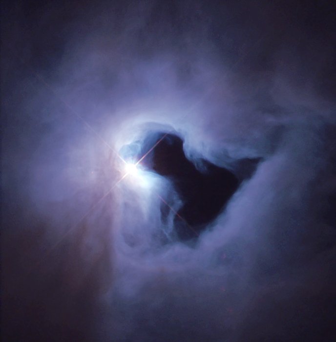 esa's tweet image. A #Halloween  hole in #space spotted by #Hubble - @ESAScience image of the week esa.int/spaceinimages/…