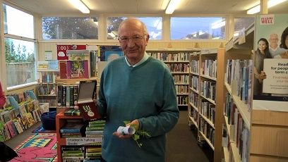 DorsetLibraries's tweet photo. A Royal Voluntary Service 15 year medal being presented recently one of our amazing Home Library Service volunteers at #LymeRegisLibrary https://t.co/aNJTYEo4i1