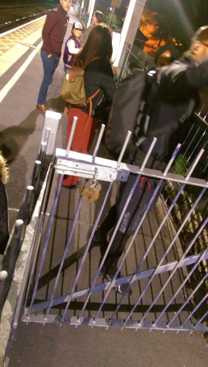 VHitkari's tweet photo. GWR at Langley, station. Train arrives, gates locked! Climbing and injuring ourselves, no response to email I sent, sad!@GWRHelp @NRE_GWR https://t.co/tSAROSspqV