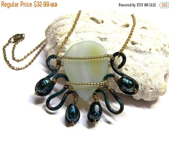 lunaessence's tweet photo. On Sale Aqua Blue Chalcedony Necklace Gemstone Pendant Oxi… https://t.co/8Y9AUuwGgU #HandmadeJewelry #WrappedPendant https://t.co/aQei5Kh6rb