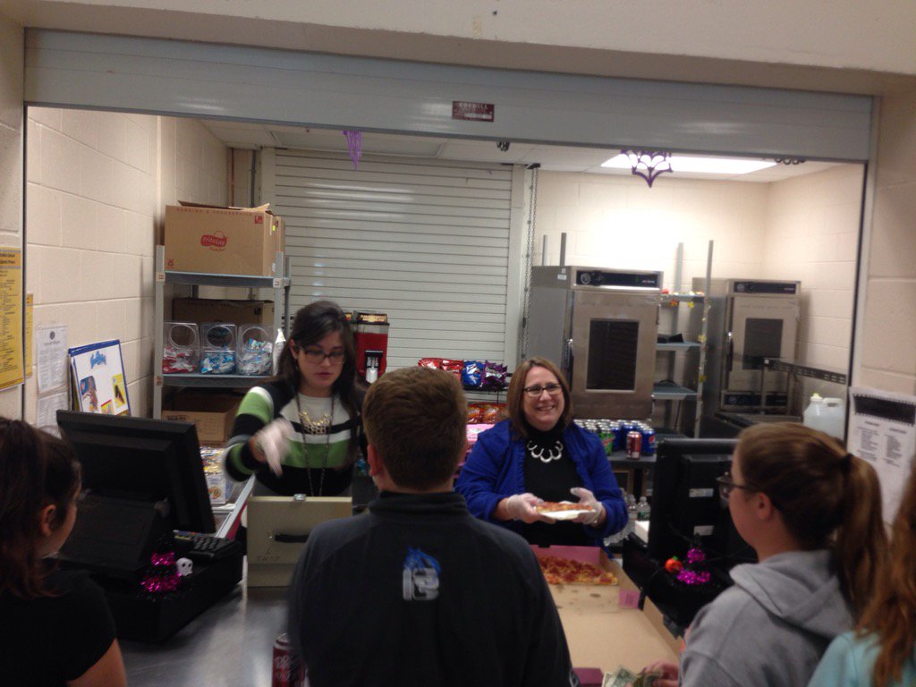 Our amazing leader <a href="/sjgotlib/">Stacy J Gotlib</a> is serving 🍕at the Swamp during our 7th grade social! <a href="/RSMSGATORS/">River Springs MS</a>