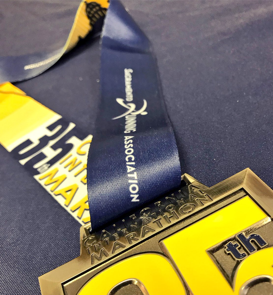 runSRA_CIM's tweet photo. For this #MedalMonday, here is a sneak peak at your finisher medal for #CIM35! 🏅 https://t.co/HY6bC0ynNe