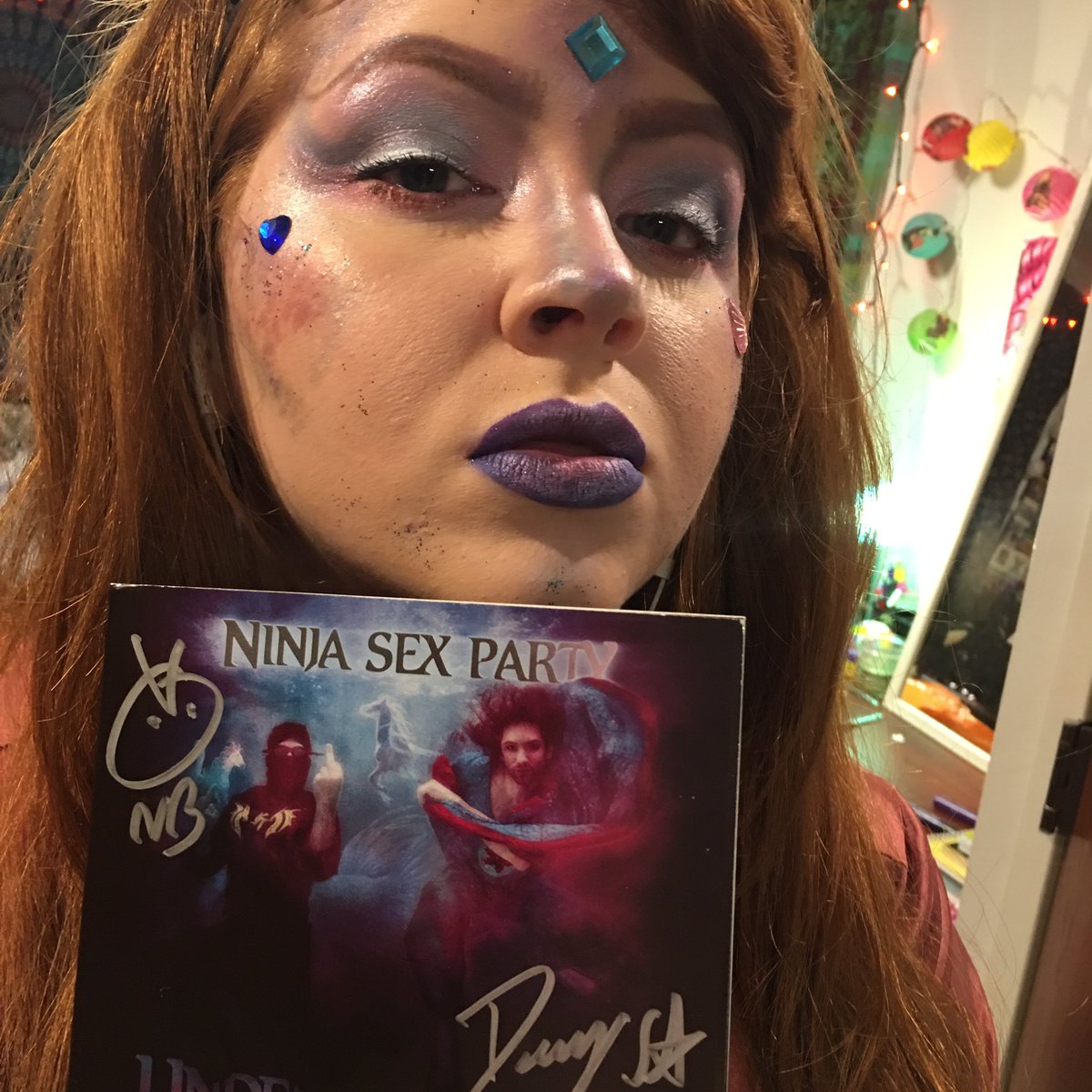 just_a_redhead's tweet photo. So I got my @ninjasexparty #UTC2 album today and wound up with mermaid makeup (for work) that goes with the album's color scheme? Idk #motd https://t.co/txkz0W5xlj