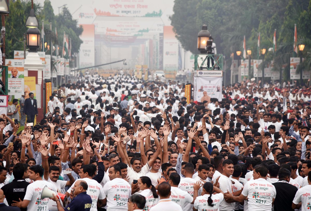 BJP4India's tweet photo. Glimpses of PM Shri @narendramodi flagging off #RunForUnity on #RashtriyaEktaDiwas at Major Dhyan Chand National Stadium, New Delhi. https://t.co/cNYuDUoK85