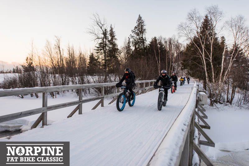 NorpineClassic's tweet photo. Over the bridge and through the woods @NorpineClassic @MGCycling @spokesmnbike @spokengear_MN #fatbike #fatbikeracing #fatbiking #cycling https://t.co/PRNkIS7Kl8