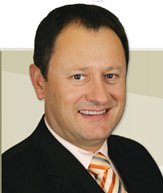 AFRIMAT THE SUPPLIER OF MAIN INGREDIENT IN RDP BRICKS CHARGED FOR ABUSE OF DOMINANCE. AFRIMAT CEO Andries J van Heerden.