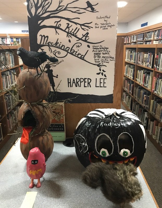 CalhounLibrary's tweet photo. Happy Halloween! Don't forget to come by the library to vote for your favorite pumpkin! https://t.co/qkom90ALdL