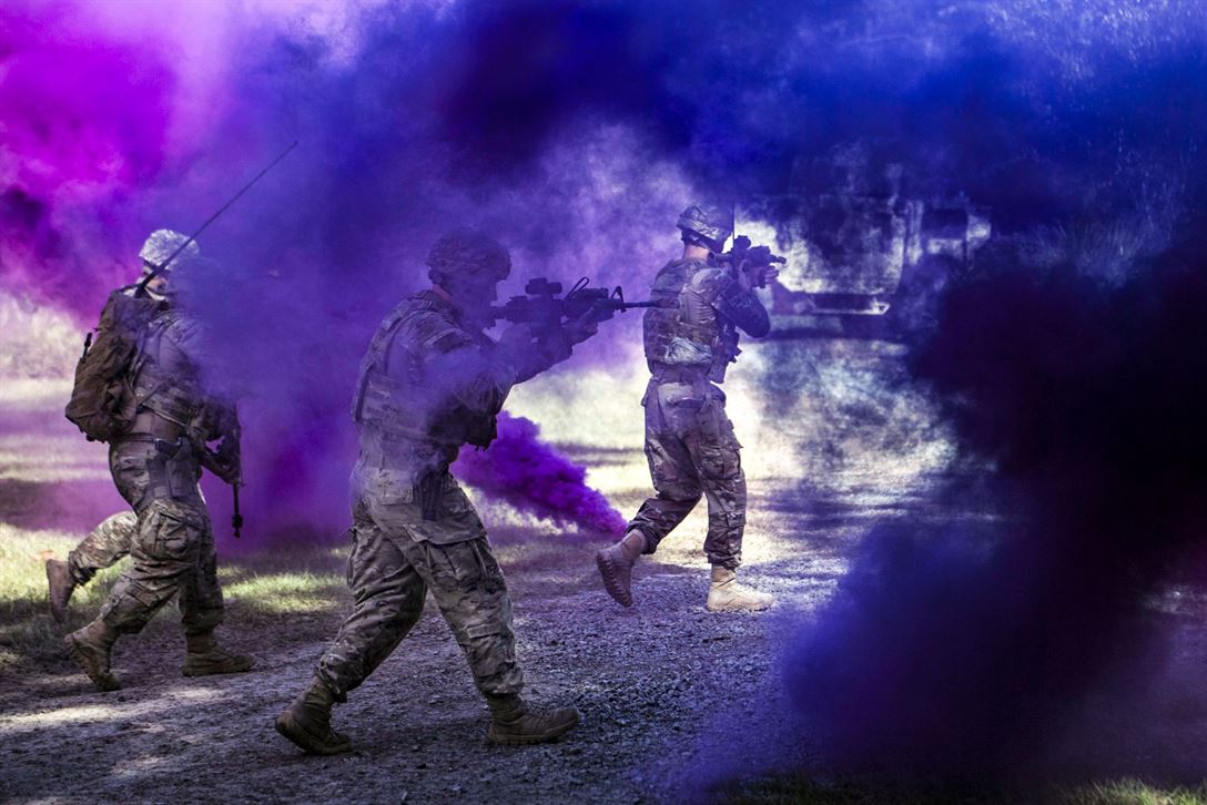 DeptofWar's tweet photo. Purple Mood. @USAirForce #airmen assigned to the 820th Base Defense Group demonstrate capabilities at Moody Air Force Base, #Georgia. https://t.co/FV5bI9BKQ1