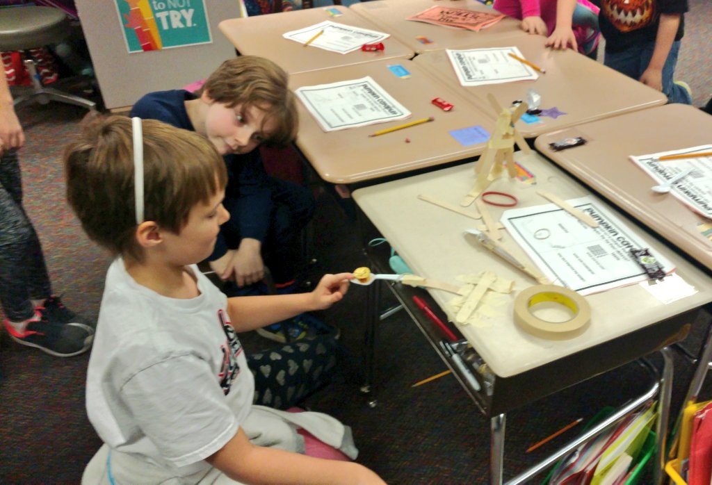 MrsKadrlik's tweet image. Launching pumpkin (Reese&apos;s mini-cup) catapults. #SpookySTEM #NOTbattlereadybutwehadfun #cfelem #WeGotThis