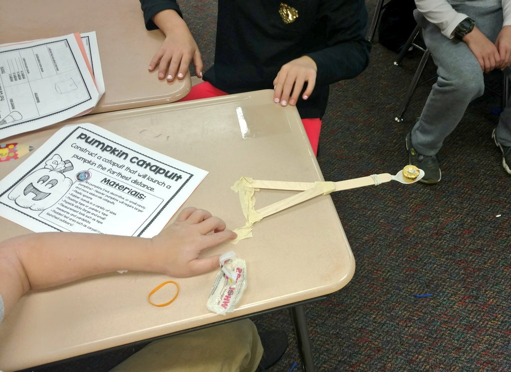 MrsKadrlik's tweet image. Launching pumpkin (Reese&apos;s mini-cup) catapults. #SpookySTEM #NOTbattlereadybutwehadfun #cfelem #WeGotThis
