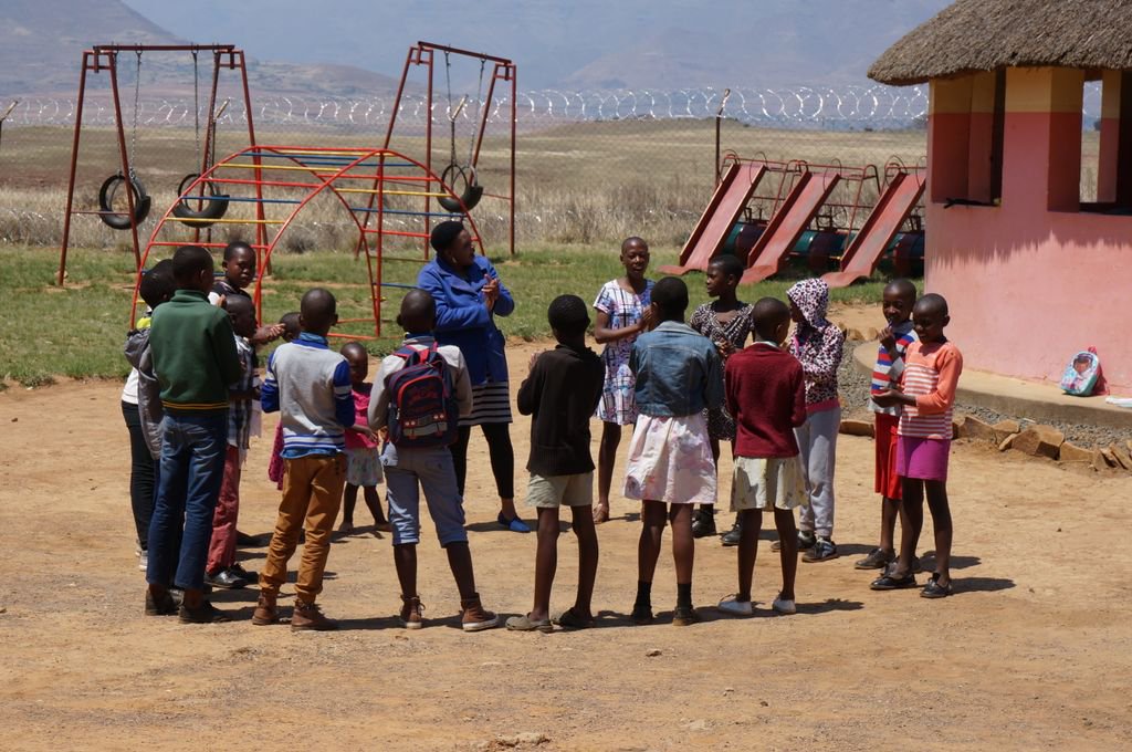 HelpLesotho's tweet photo. Games with M'me Thoala at the #Pitseng Centre in #Lesotho ! Kids deserve play time, no matter their circumstances. https://t.co/KH1rLgD30l