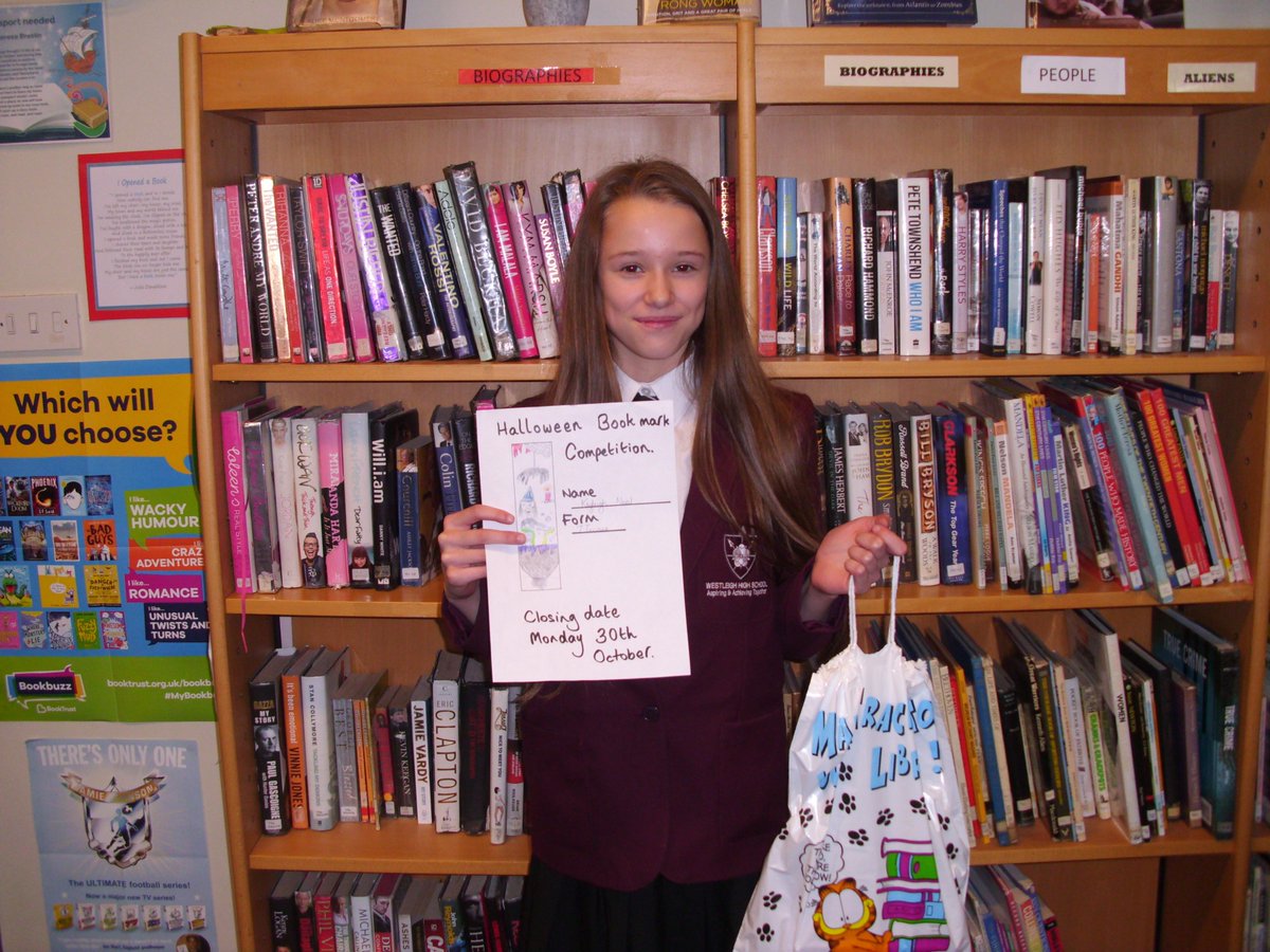 LibraryHigh's tweet image. Halloween bookmark winner Kayleigh Neal with her winning entry and prizes @WestleighHigh @WHSteamenglish Well done Kayleigh!