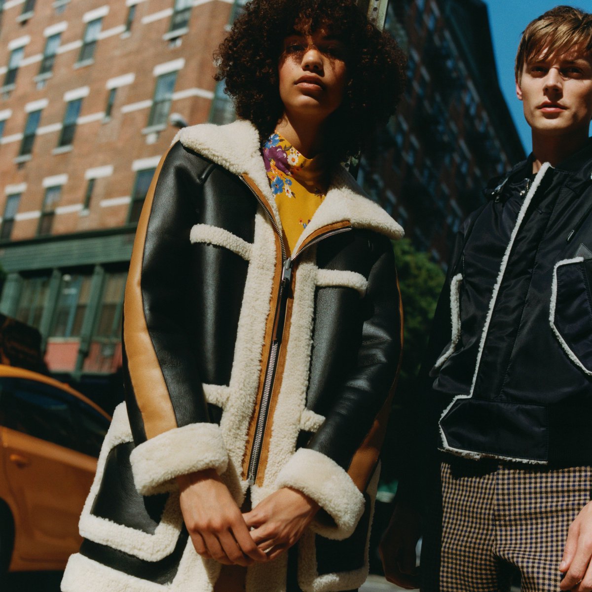 Coach's tweet photo. Shearling on the inside. Leather on the outside. Wear the Reversible Parka one of two ways. #CoachFall2017 #CoachNY https://t.co/FksyEpLw2O https://t.co/q7RzbKx519