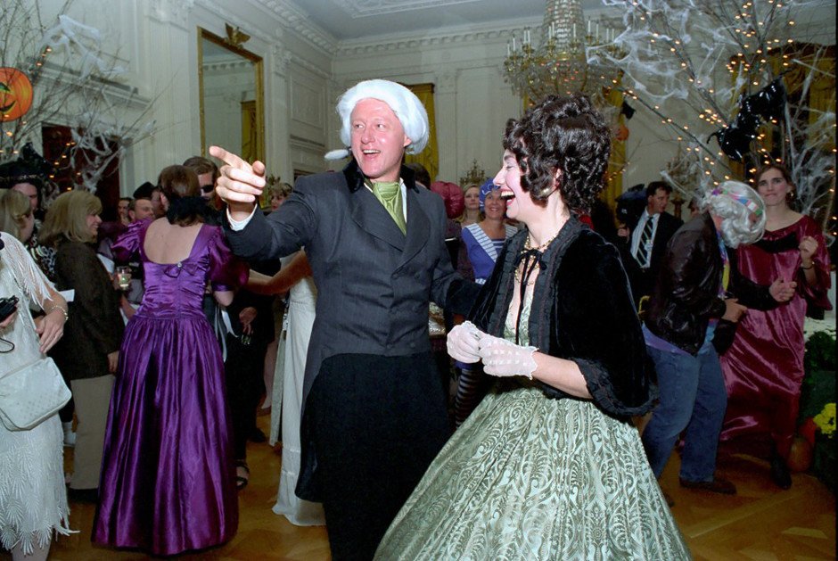 politico's tweet photo. 🎃 Bill and Hillary dress as James and Dolley Madison in this 1993 photo. See more White House Halloween photos: https://t.co/TTVt0N7HP1 https://t.co/o1oHWqhyD5