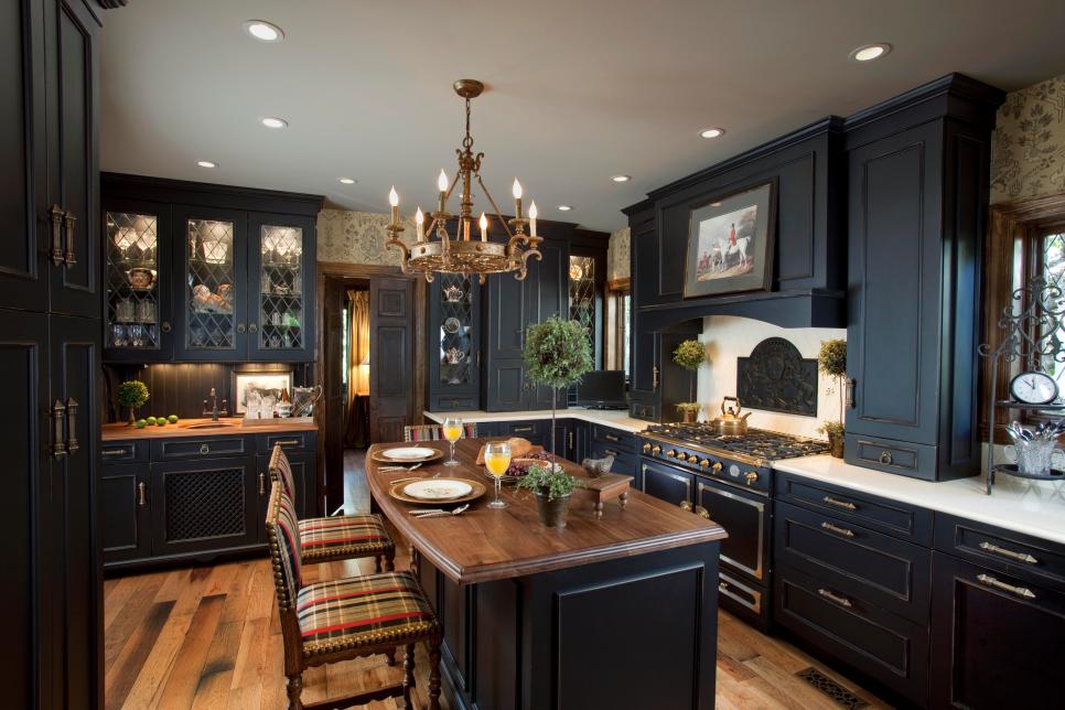 InnovativeKIT's tweet photo. Black distressed cabinets with a mixture of warm wood and #quartz counter tops in this #traditional #kitchen https://t.co/4bsBXRlJfF