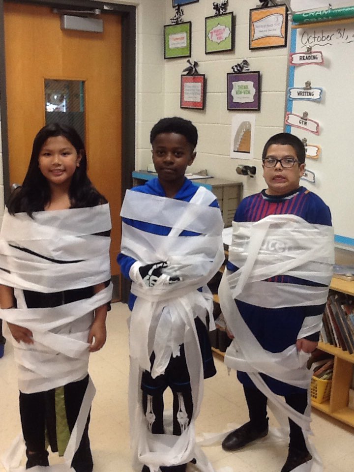 Enjoying our Halloween mummy wrap!