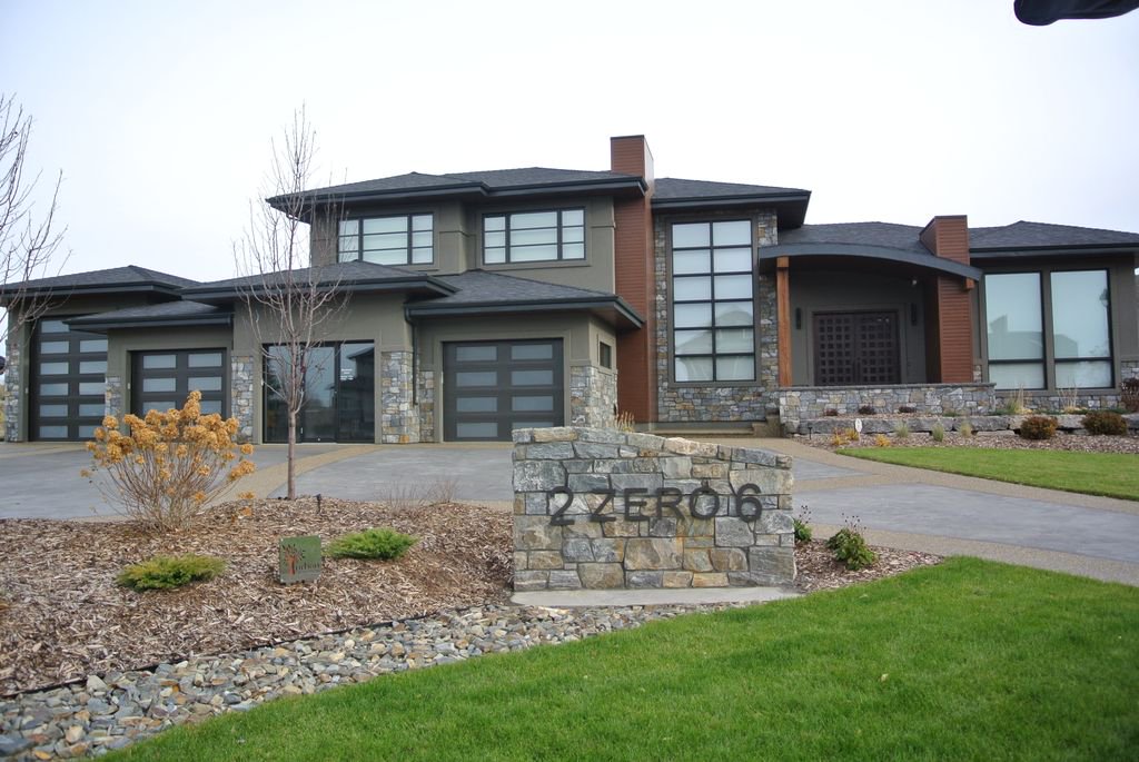 Tysonk2stone's tweet photo. Check out this stunner by Heredity Homes in Sturgeon County!  Canadian Granite Ledgestone by O'Neil Brothers Masonry #k2stone k2stone.ca https://t.co/1J1IhbH8vj