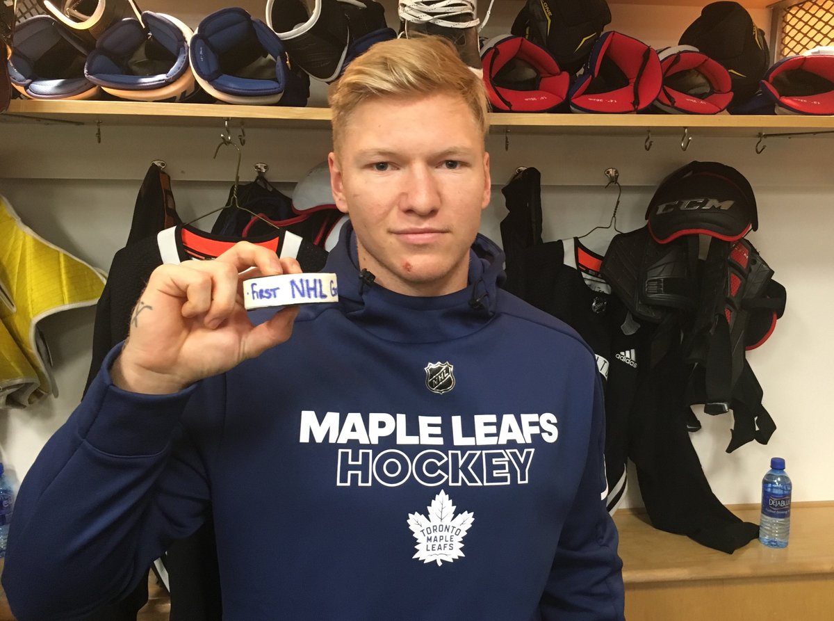 MapleLeafs's tweet photo. After 2 scoring changes, @andreasborgman officially gets his first @NHL goal.

The players kept the puck for him just in case. #TMLtalk https://t.co/i4QJhMzaSM