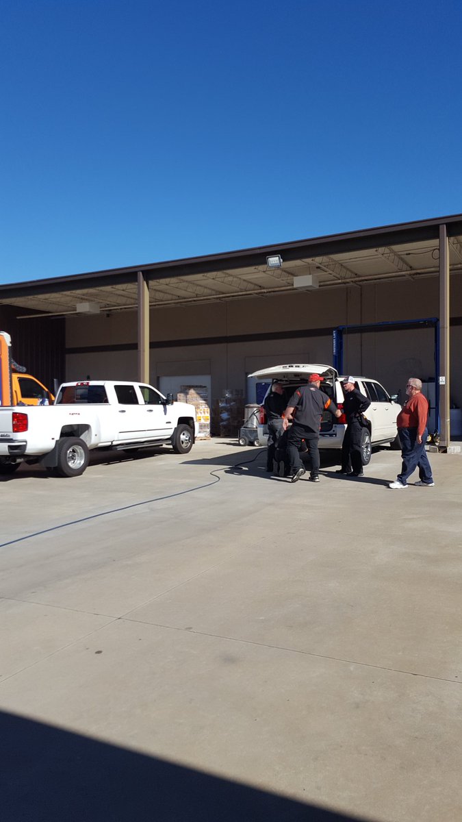 How many people does it take to put the spare tire back under <a href="/JRMotorsports/">JR Motorsports</a>