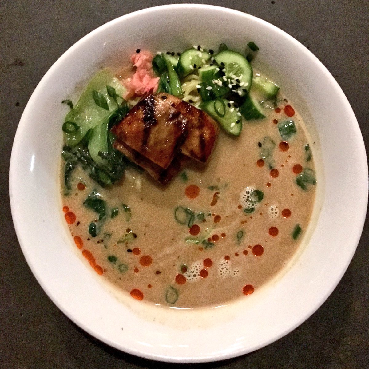 VStreetFood's tweet photo. Creamy Miso Ramen with glazed king oyster mushrooms, bok choy, cucumber and chili oil. https://t.co/k7J5Kwr23X