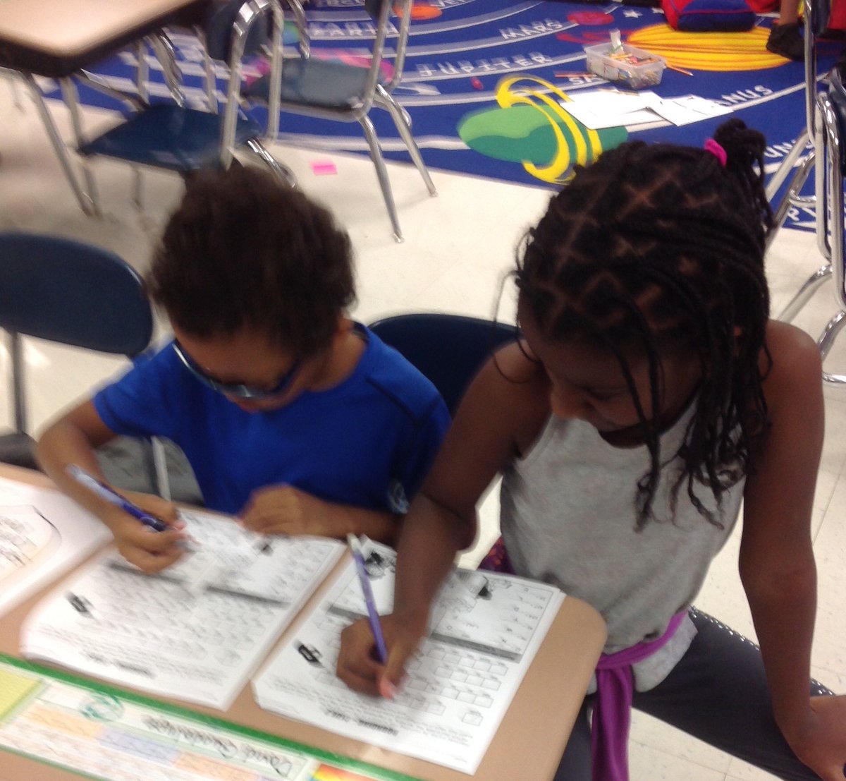 Grade3rd's tweet photo. Solving Math Mysteries in Mrs. Anderson's room! https://t.co/ghMBiWT3Af