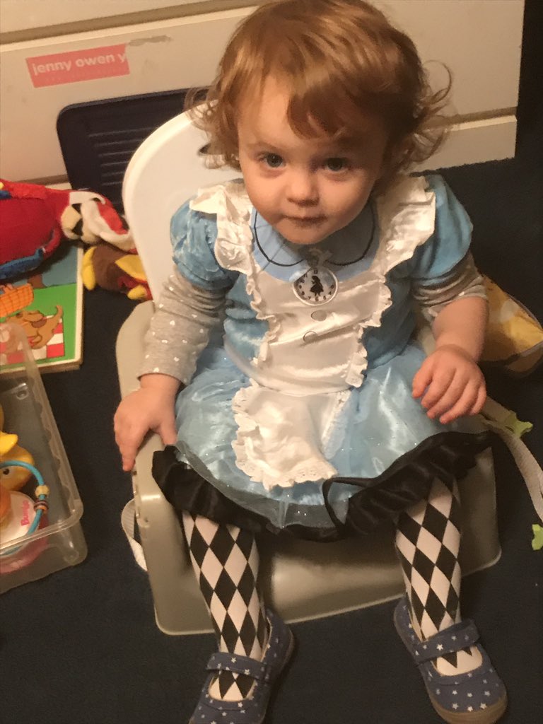 NYLaura's tweet photo. @hansonmusic My Alice as Alice in Wonderland. She is sitting in a booster seat :) https://t.co/Rkr4yHdo5b
