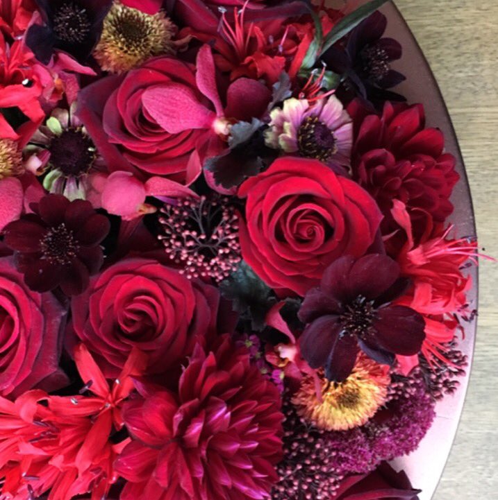 #flatlay #wednesday with some warming winter colours as the cold arrives. #winter #winterflowers #florist #red