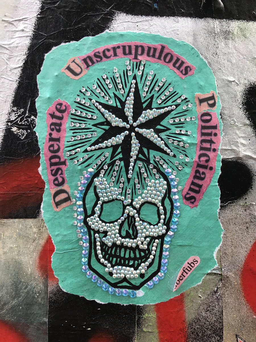 lovestreetart22's tweet photo. Uberfubs sequinned skulls with poignant messages. #StreetArt #Uberfubs #BrickLane https://t.co/Cdf0N1wSmm
