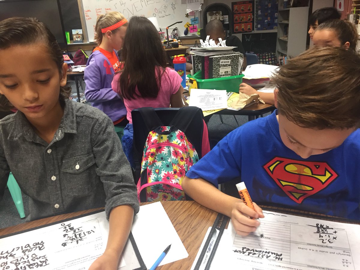 MrsSlaydon's tweet photo. Reviewing decimals with error analysis at my teacher small group. #schultzshines #schultz5th https://t.co/6WNiffPcTY