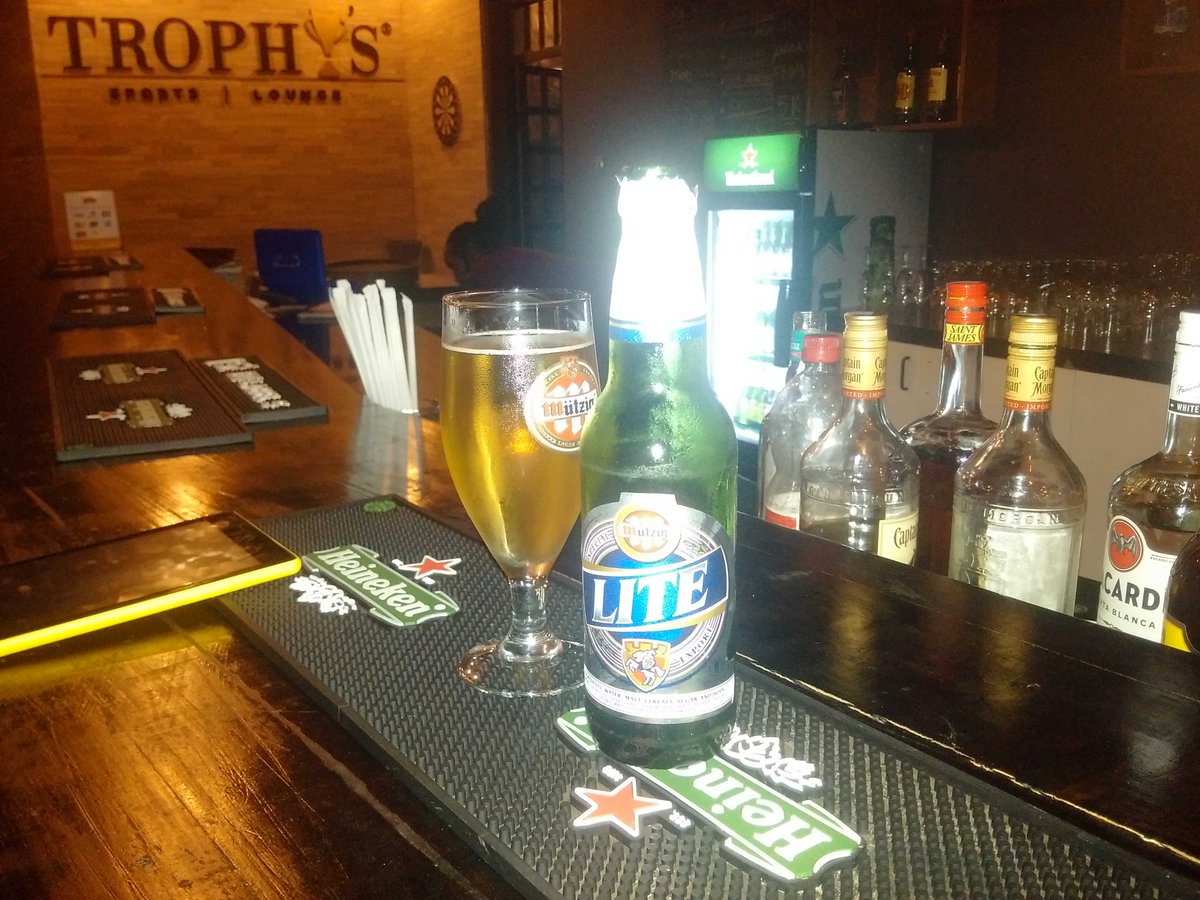 TherealKwizera's tweet photo. A champions league night needs a real beer #Liverpool #YNWA #MutzigLite https://t.co/VviMNXDnWe