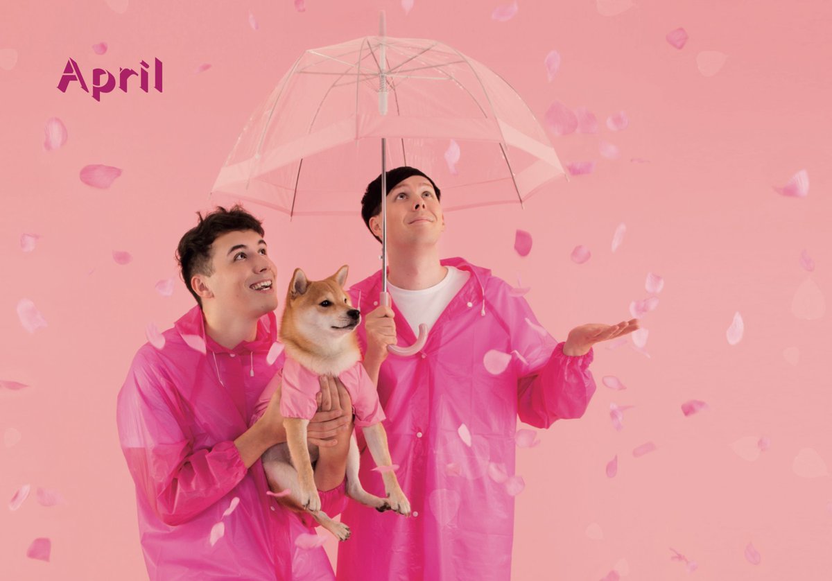 dan-presenting-the-dan-and-phil-and-dogs-2018-calendar