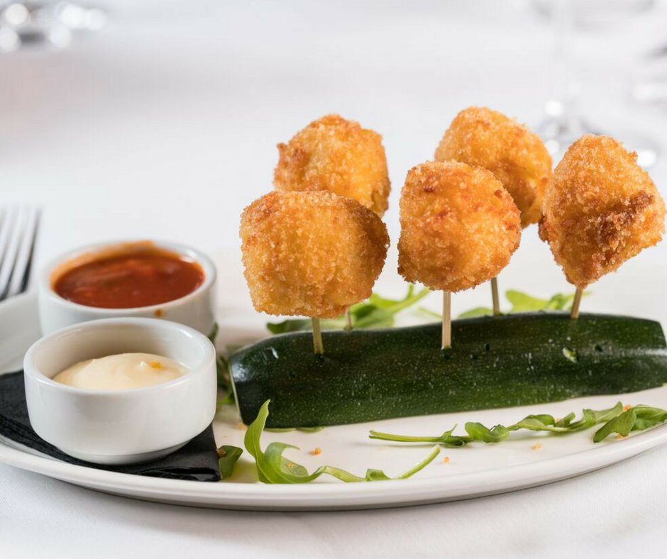 Our Mac &amp; Cheese lollipops make the world go round!