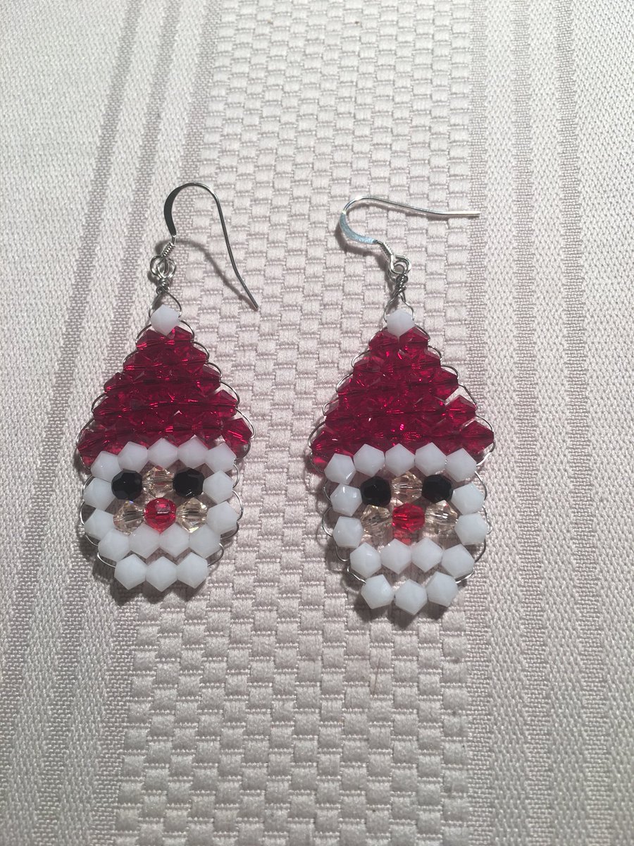 Check out my holiday earrings, makes a wonderful gift they can be yours for $20