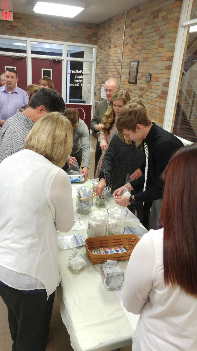 WatsekaHS's tweet photo. WCHS NHS members and family build medical kits for the organization Sole Hope to help children in Africa. #warriorpride https://t.co/b0aYPtEtXq