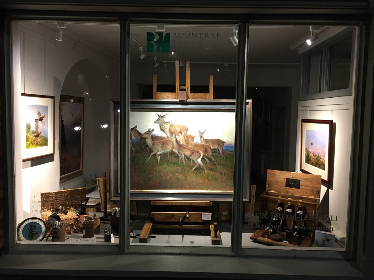 Petworth window at night. #sparkly #deer #sloegin