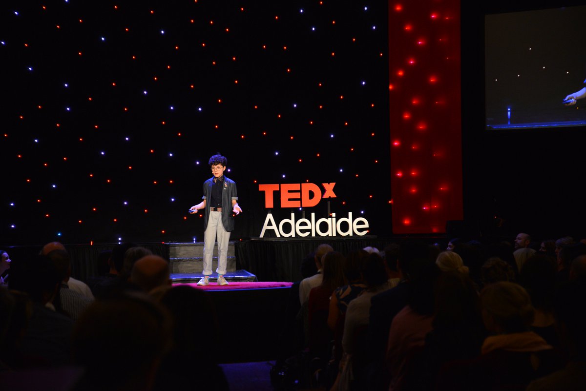 TEDxAdelaide's tweet photo. Audrey’s confidence on the #TEDxAdelaide red dot is inspirational. We don’t have to identify with a specific gender. #binarism https://t.co/IFSeM8YtBV