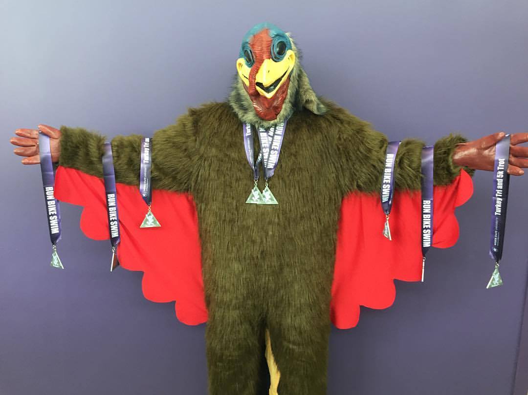 WeberStateU's tweet photo. There's still time to register at for the 13th Annual Turkey Tri and 5k Trot, where you can earn on one of these sweet medals, presented by our creepy #WeberRec turkey. The cost goes up Friday night, so sign up now at https://t.co/7OOEtPn8k8. #WeberState https://t.co/1duz6BlDiL