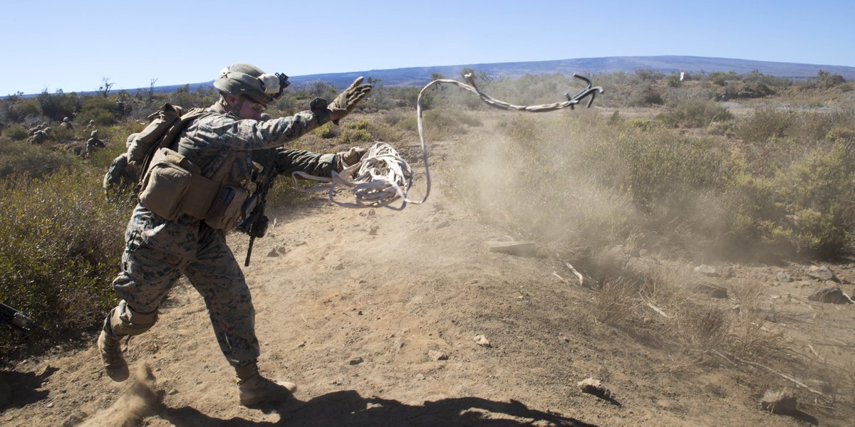 U.S. Marines on X: Hook 'Em A Marine throws a grappling hook