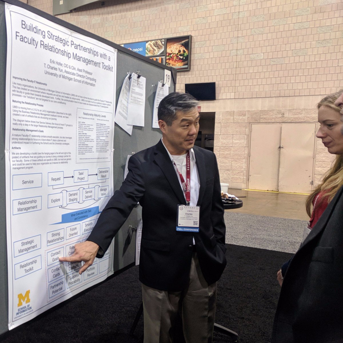umichTECH's tweet photo. T. Charles Yun represents @umsi and #MichiganIT at #EDU17 with a poster about how to improve the faculty-IT relationship. @tcywork w/@ehofer https://t.co/OWBuvC8UvS