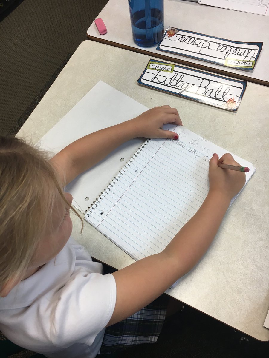 PESLowerSchool's tweet photo. #pesfirstgrade learned how to properly hold their pencil today during a handwriting lesson! https://t.co/yol97sPR8a