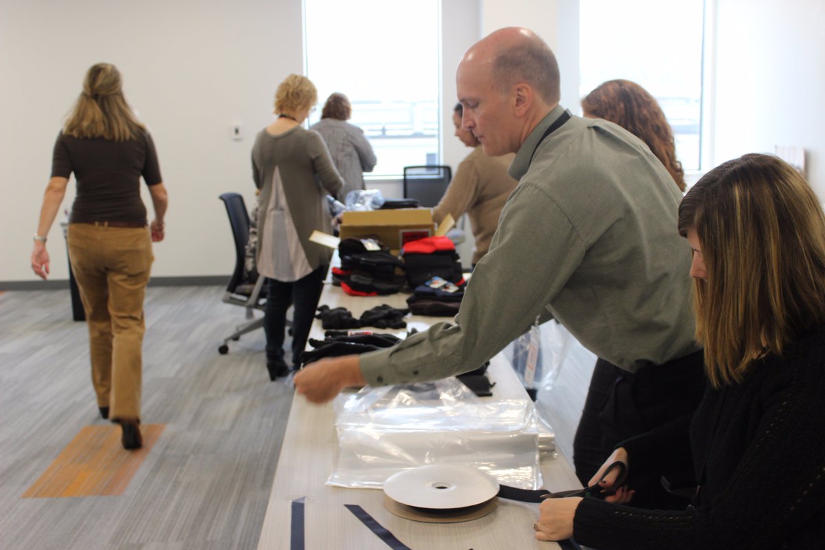 UKGInc's tweet photo. Today, Kronites packed winter care packages for @LazarusHouseInc, made dog treats for @LowellHumane, & more! #WorkInspiredWeek #GiveInspired https://t.co/EsUyRNW6sk