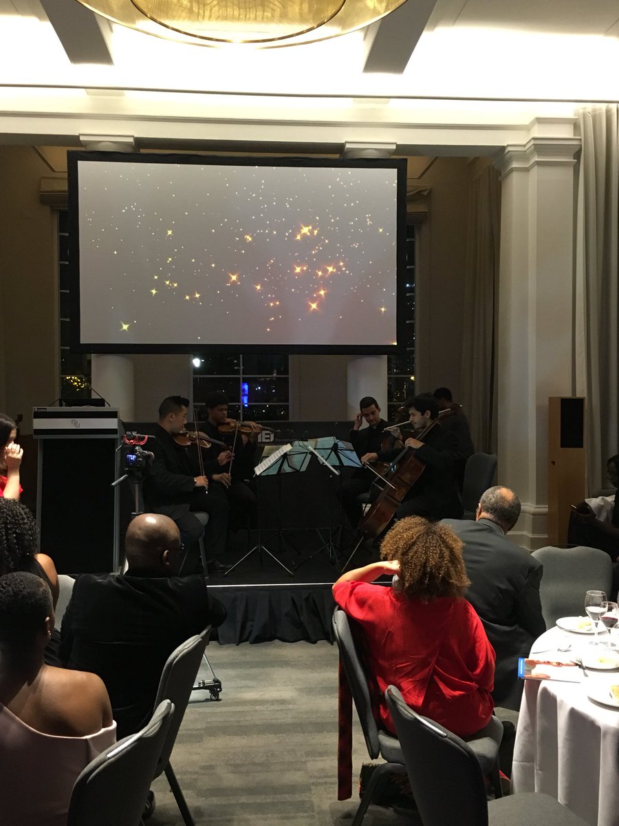 AFBE_UK's tweet photo. And now for some fantastic classical entertainment from the Chineke Orchestra 🎼🎼 #AFBEis10 🥂🎉 https://t.co/q6jcwaHBgU
